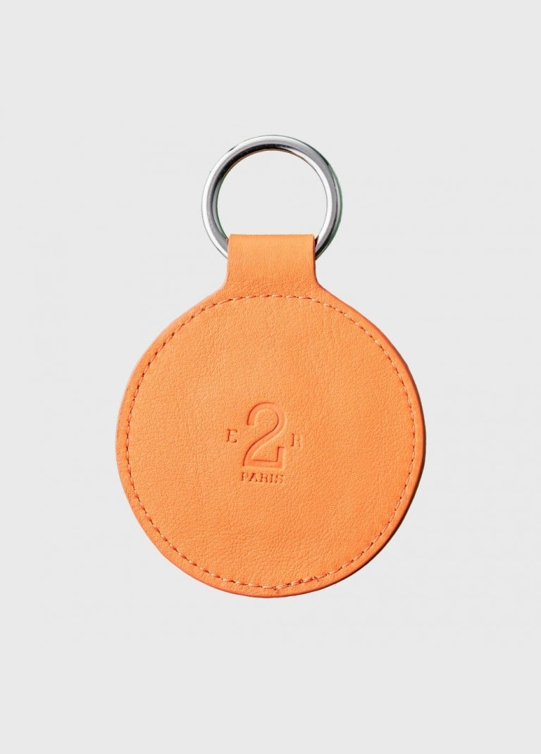 Porte clés vintage en cuir orange et blanc numéroté - E2R