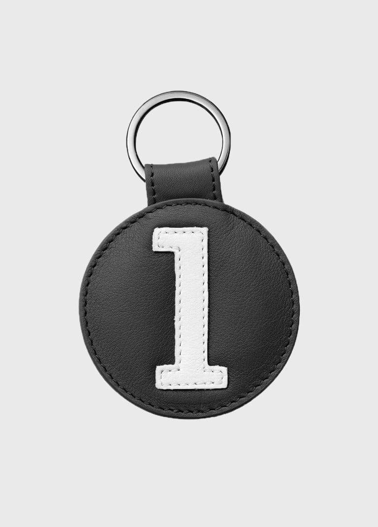 Porte clés luxe en cuir noir et blanc numéroté