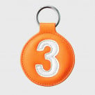 Porte clés vintage en cuir orange et blanc numéroté