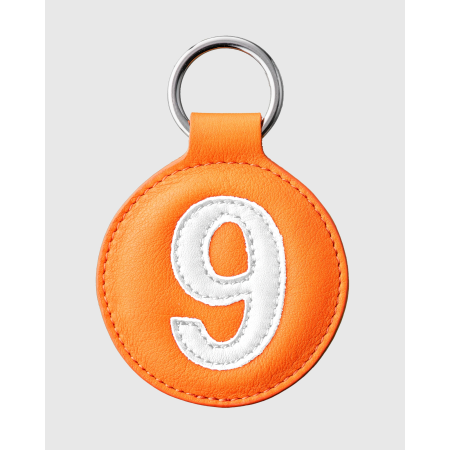 Porte clés vintage en cuir orange et blanc numéroté - E2R