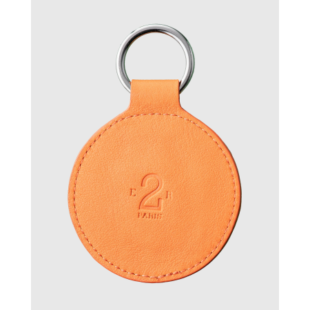 Porte clés vintage en cuir orange et blanc numéroté - E2R